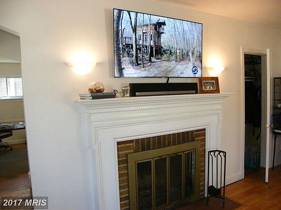 Living Room with wood-burning fireplace