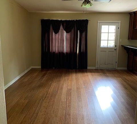 Living room with door to backyard