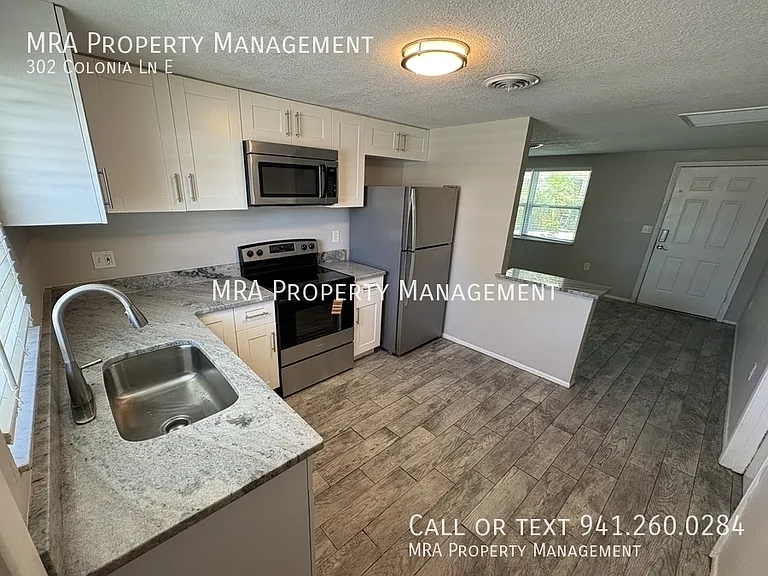 302 Colonia Ln E — Photo 4