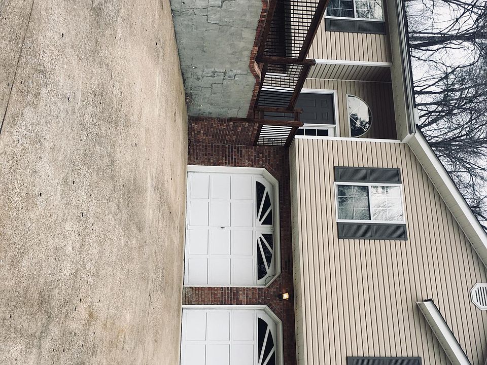 Split level home . With full unfinished basement .