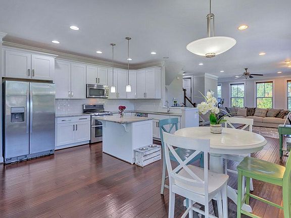 Kitchen w soft close maple cabinets. Double oven