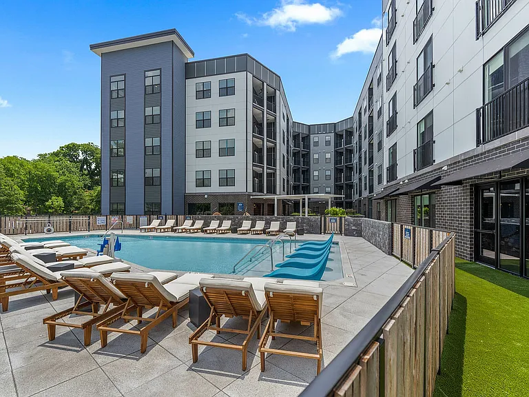 pool with yard and courtyard