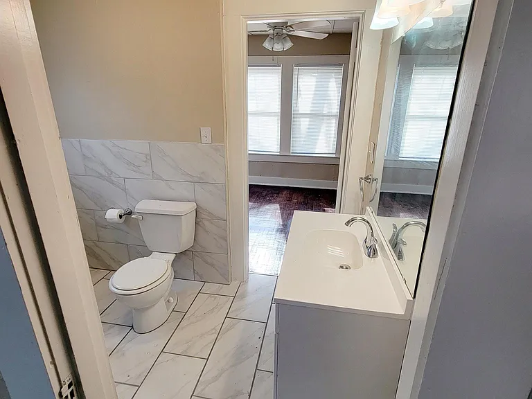 View of all new vanity and lighting