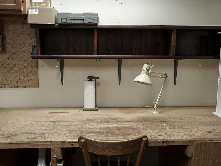 unfinished storage/laundry/work bench