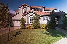 Exterior of Home with Stucco and Concrete Roof tiles