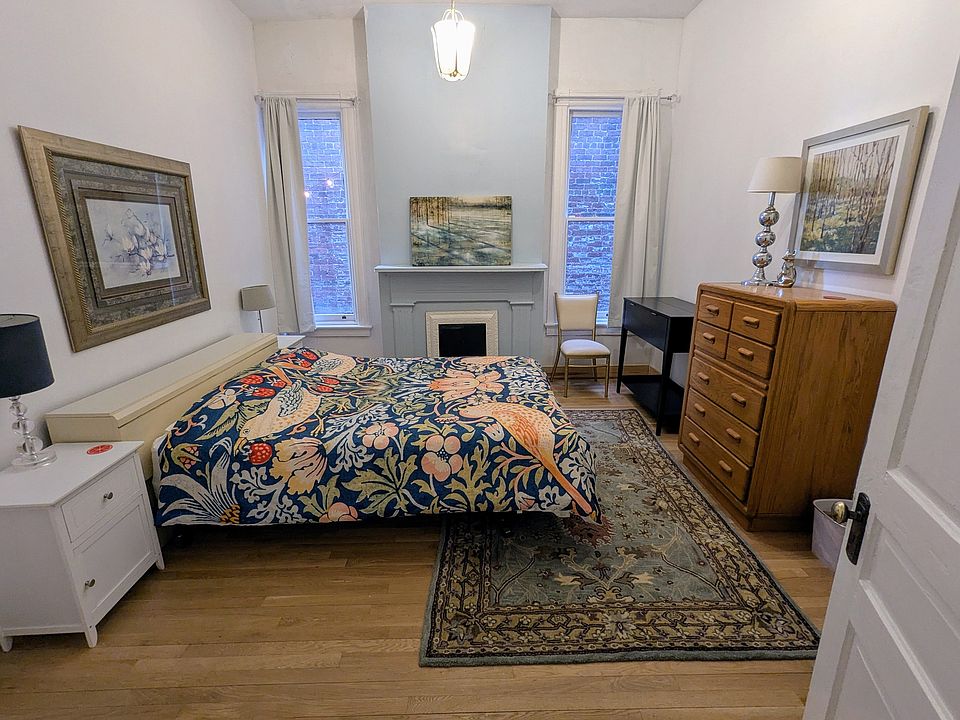 Bedroom 2 is about 14'x12'. Both bedrooms are roomy! With plenty of dresser/storage space.