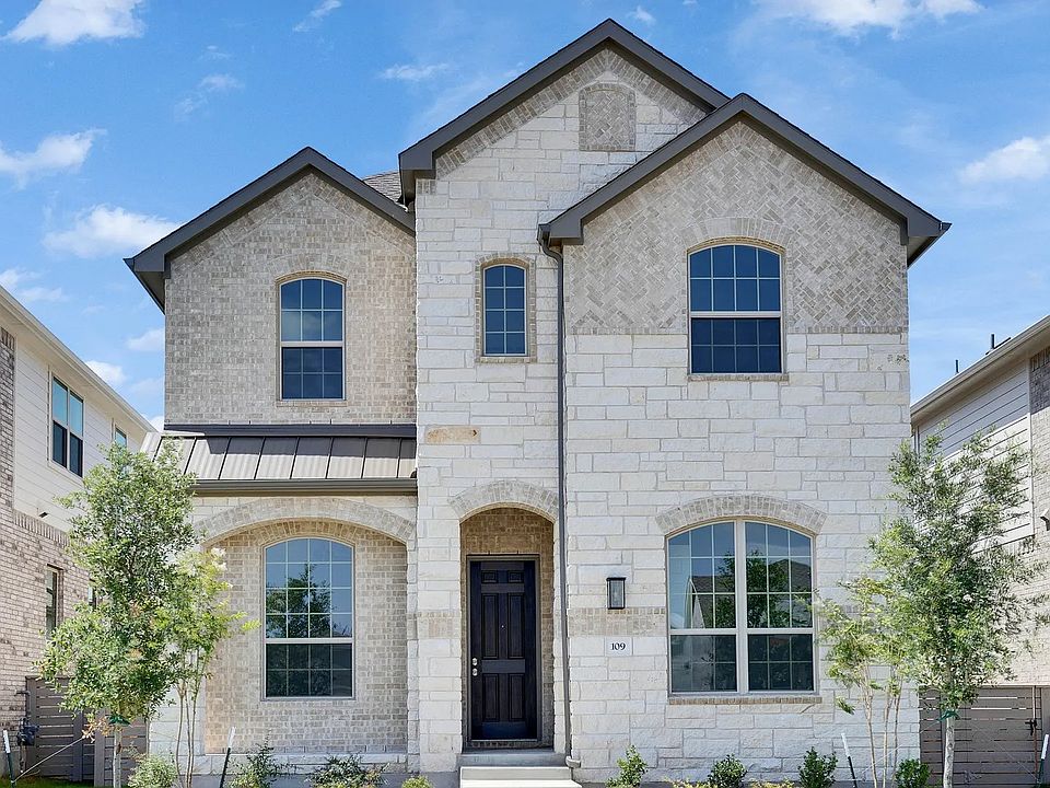 Exquisite stonework and elegant archways define this stunning residence, set in a serene suburban lo