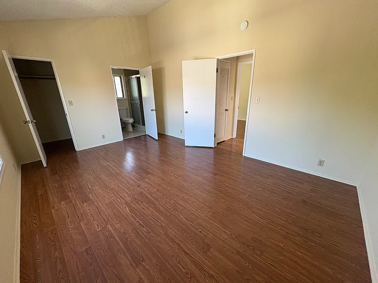 Huge bedroom with cathedral ceilings and private bathroom