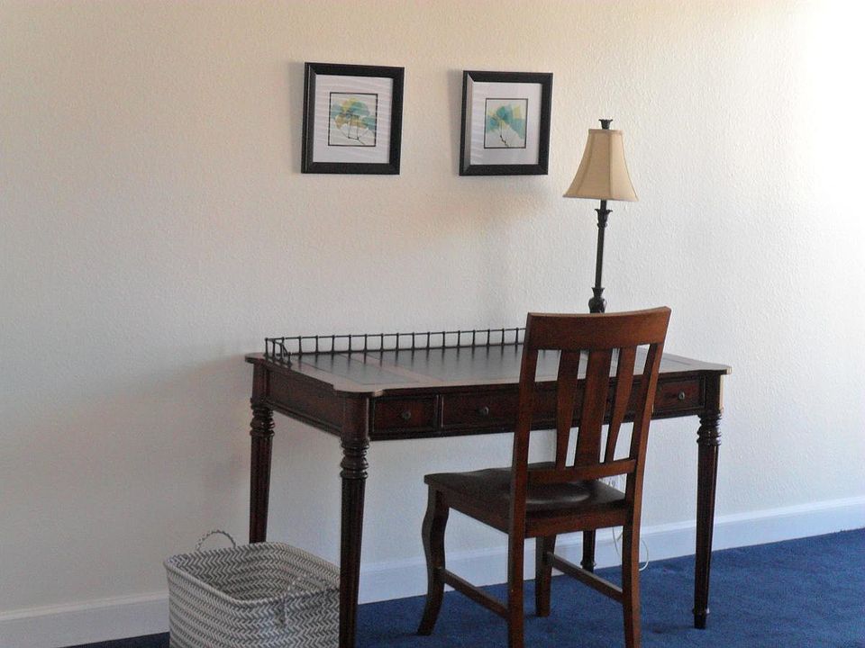 Work station with wireless internet. (old carpet pictured. )