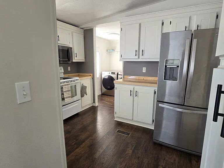 Kitchen
"Functional and welcoming kitchen with plenty of storage space."
