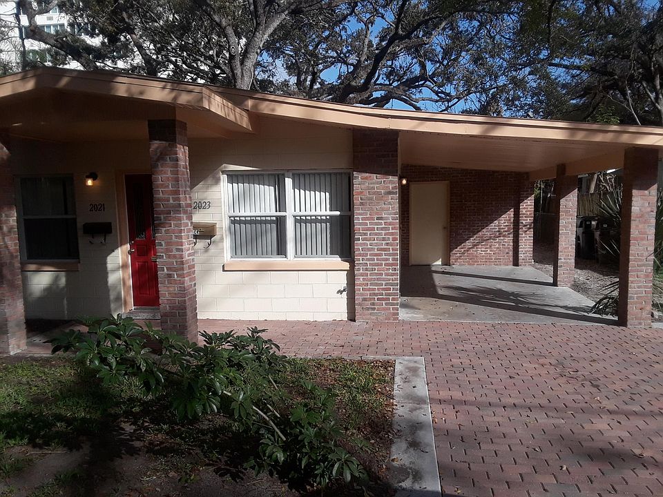 carport with large laundry in rear