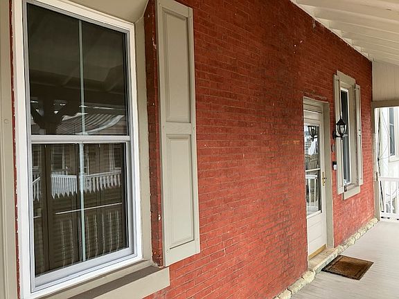 Porch with new windows (March 2025).