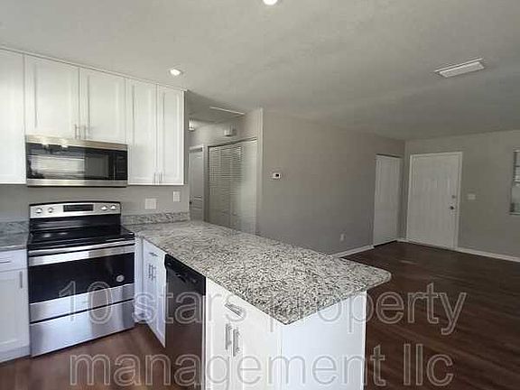 4th image of 4961 91st Ave N Unit A