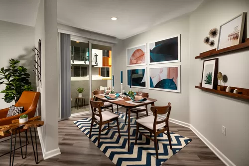 Two Bedroom Apartments in La Mesa CA - The District - Dining Room with Wood-Style Flooring - The District Apartments