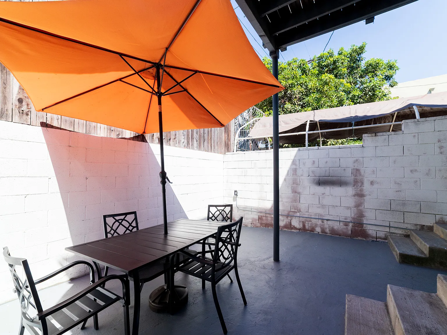 Renovated 2BR w/ Huge Private Patio | Gated, 2 Parking Spaces + In-Unit Laundry — Photo 1
