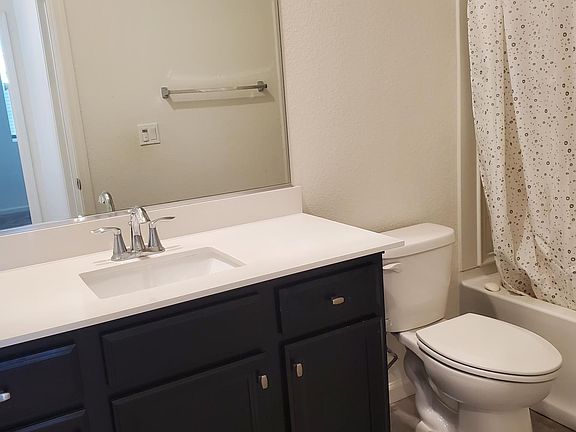 Upstairs hall bath with shower.