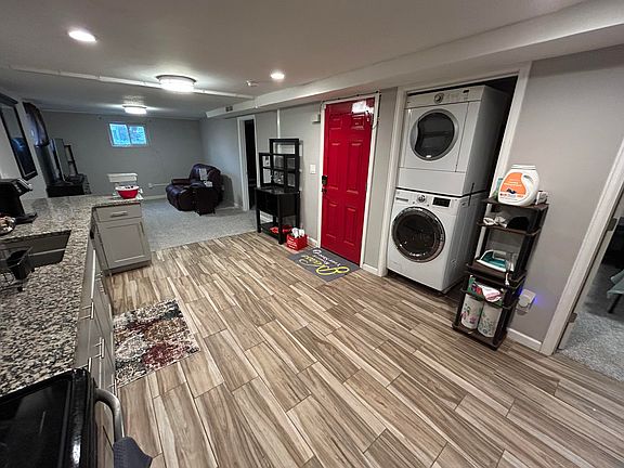 Full kitchen with laundry in unit.