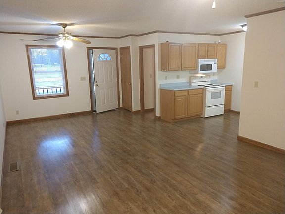 Living room looking into kitchen - other direction