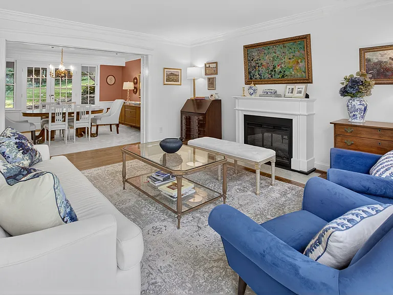 Living room with electric fireplace.