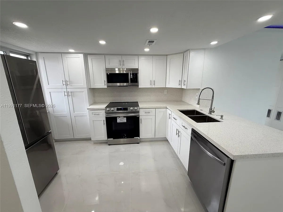 Photo 2 of 11 - 9915 W Okeechobee Rd #2-201 - Hialeah Gardens, FL Building Photo - 9915 W Okeechobee Rd #2-201