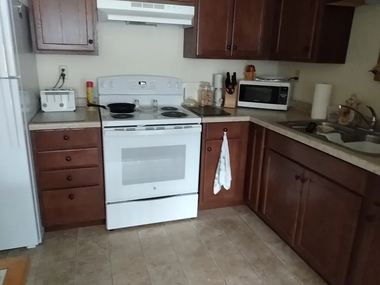 These photos are from an occupied unit. This is not a furnished apartment.