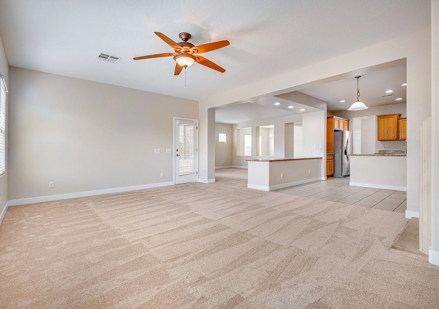 Spacious 4-Bedroom Home with Open Living Areas in Stallion Mountain Golf Club Community — Photo 4