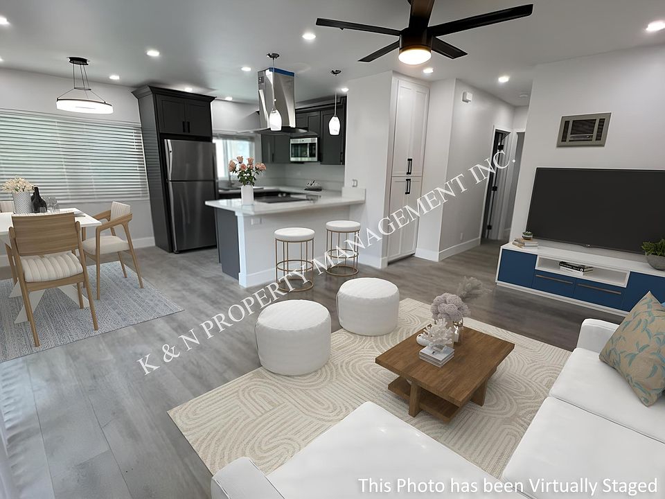 Large open living room/dining/kitchen area