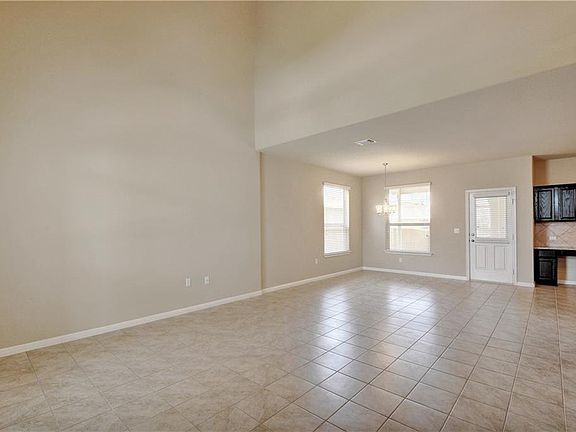 Living room flows open to the dining. Plenty of room for the largest living room sectional and multiple wall choices for that big screen TV.