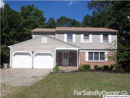 This home featuresAdd Title
						:
						taupe vinyl siding white trim partial brick front natural wood trim oak floors