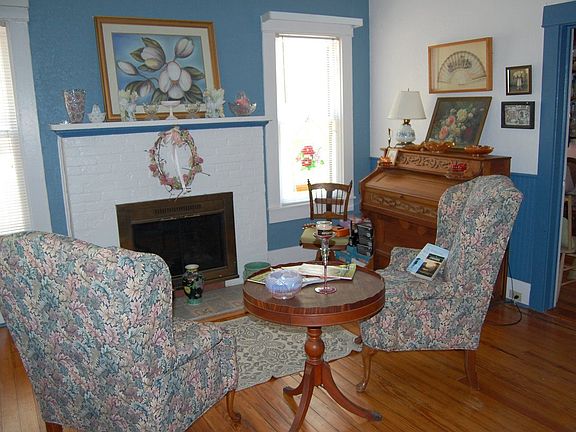 Cozy/open living area with fireplace