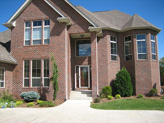 Front entry with new shrubs