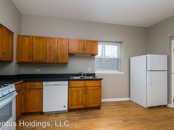 4th image of 6034 S Prairie Ave #50-1