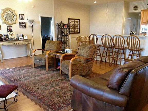 This view shows the kitchen and back toward the formal dining room