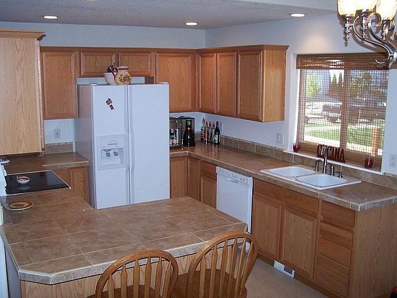 Kitchen with breakfast bar open to dining area