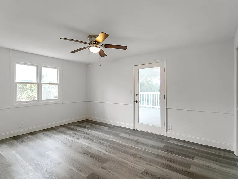 Bedroom 2- leads to back patio