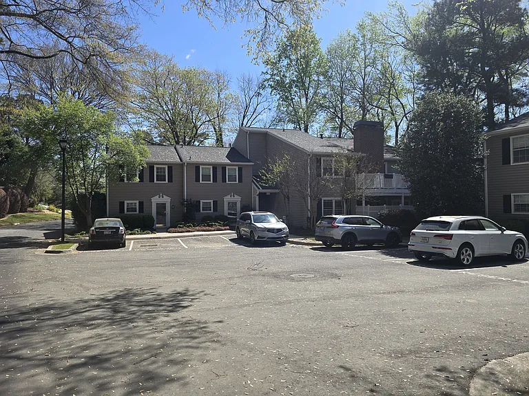 private parking spot in front of unit 1. Additionally guest parking available
