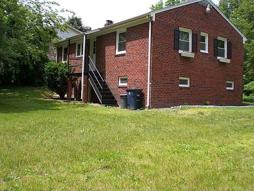 back view of house -- fully finished walkout basement, huge yard