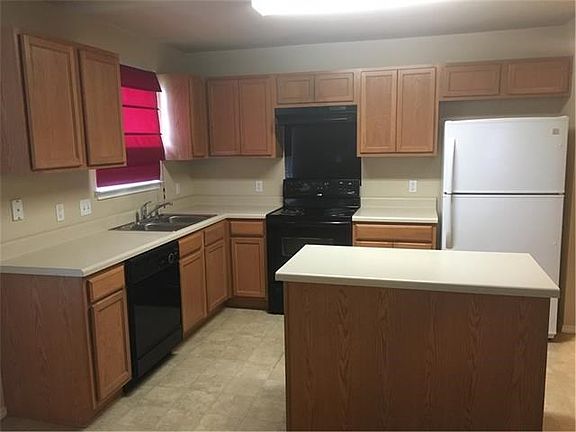 View of kitchen from living area