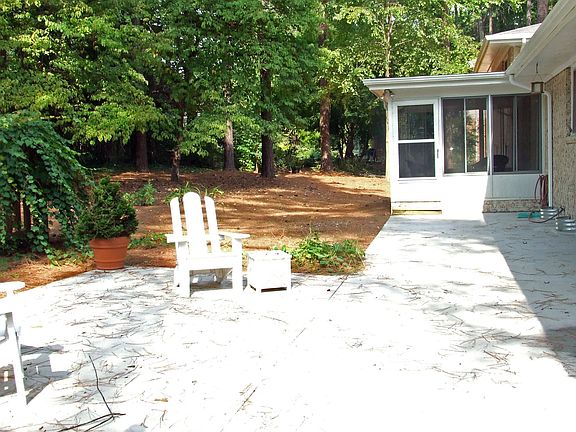 Private back patio to Sunroom