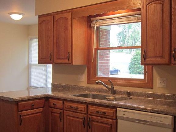 The eat in kitchen has so much natural light.