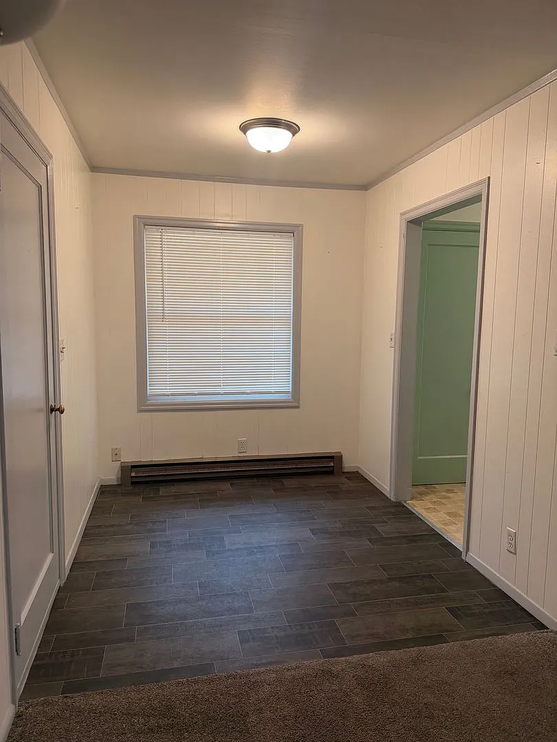 Cozy Home Set in Established Community — Photo 4