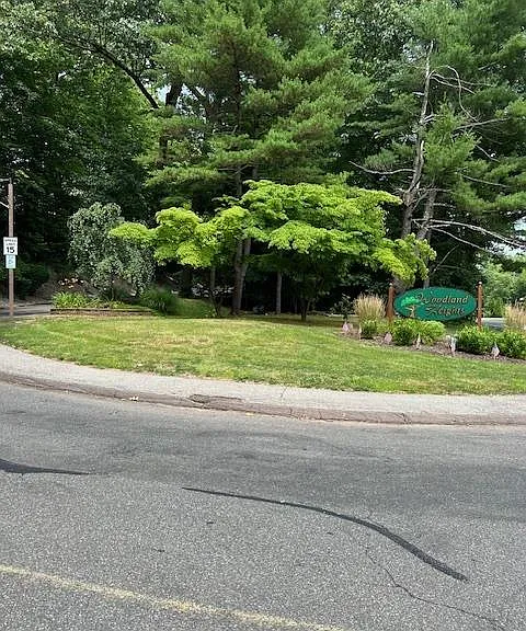 ENTRANCE TO WOODLANF HEIGHTS CONDO COMMUNITY.