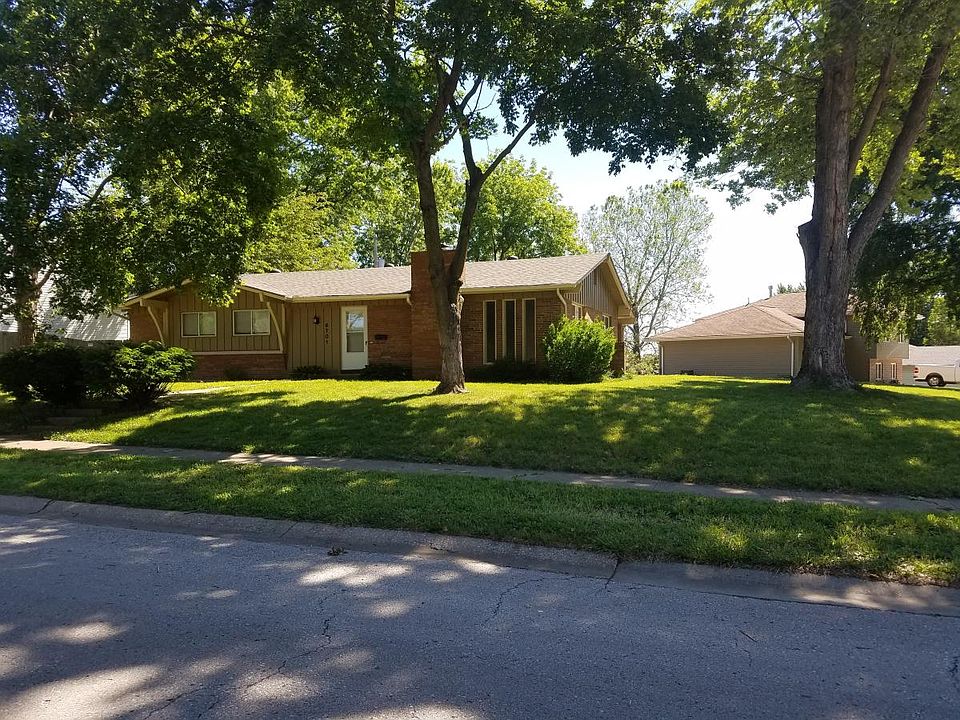 Picture of home-front view on corner lot...MANY ARKING OPTIONS FOR FAMILY & OR PARTIES