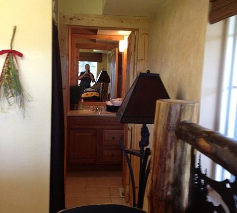 looking across bed to bathroom