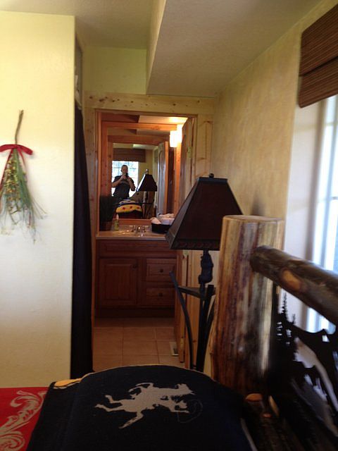 looking across bed to bathroom