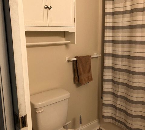 Bathroom has bathtub/shower.