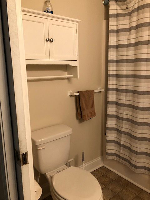 Bathroom has bathtub/shower.