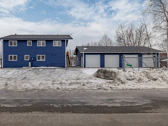 Back Exterior (tenants have first two garage bays from left)