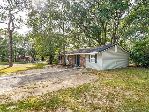 Close to USA and shopping one can enjoy morning coffee on the oversized covered front porch area that extends the entire length of the home. 
