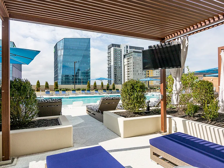 Sprawling Rooftop Deck with Stunning Views and Social Alcoves